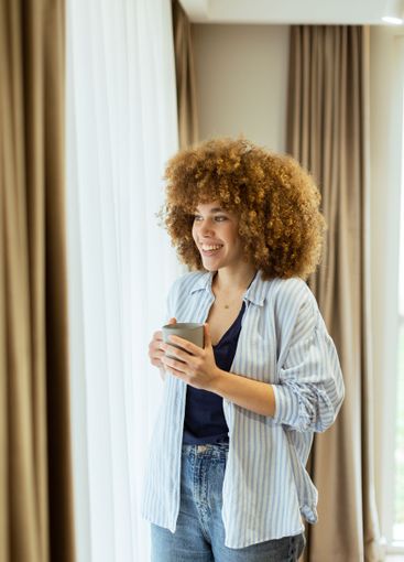 Bright morning in a cozy room filled with warm sunlight...