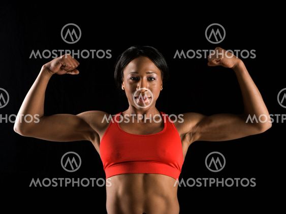 Woman flexing muscles.