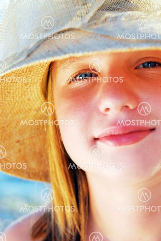 Teenage girl in a hat