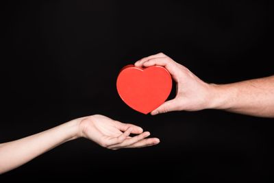 Man gives present to woman