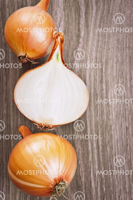Three onions on the table