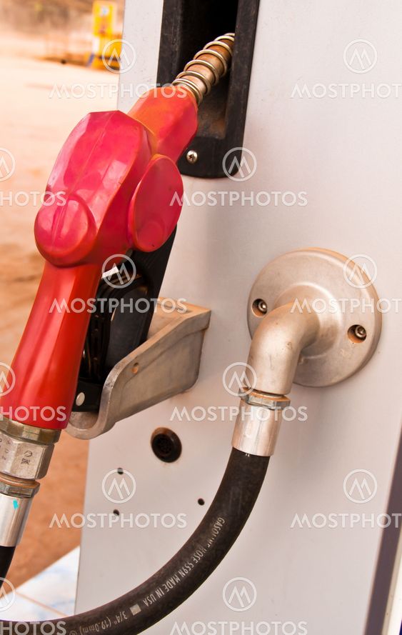 Dispensing fuel.