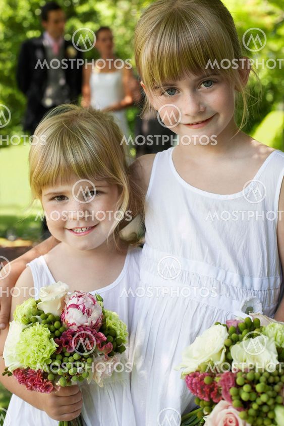Cute Little Bridesmaids Holding Bouquets