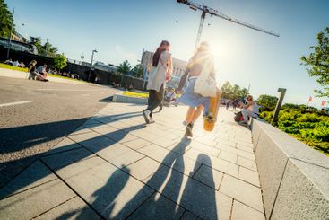 Pedestrians on city street in Helsinki, Finland