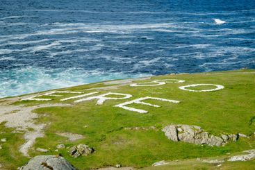 Rough and rocky shore at Malin Head, Ireland's...