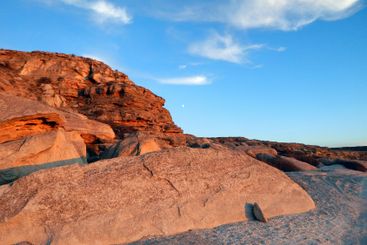 Coastal cliff at sunset.