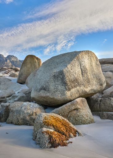 Peace, nature and rocks on beach with tropical holiday...