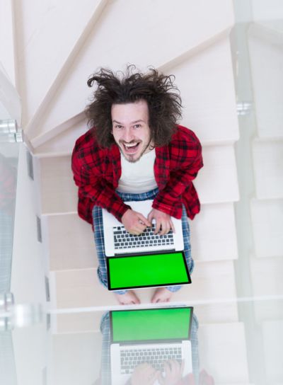 freelancer in bathrobe working from home