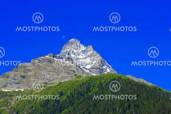 Caucasus Mountains Under Snow And Clear Blue Sky