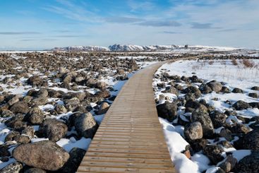 Wooden hiking trail in the rocky tundra. Teriberka