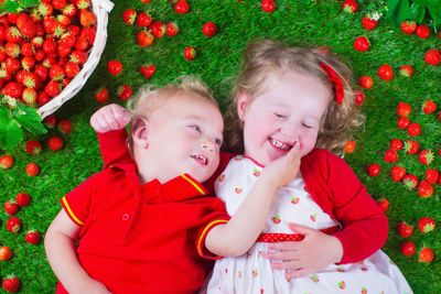 Children eating strawberry