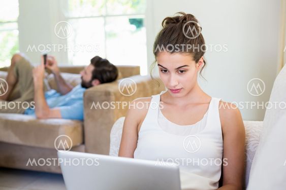 Young woman using laptop