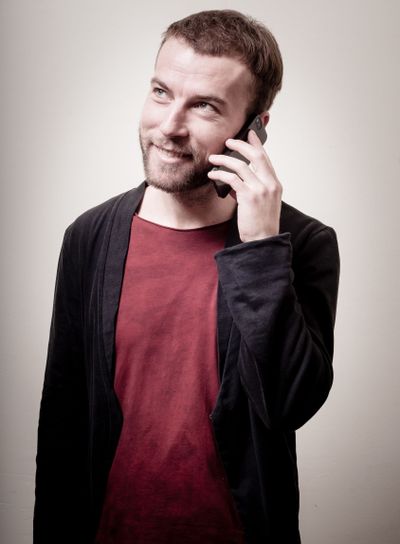 stylish hipster man on the phone