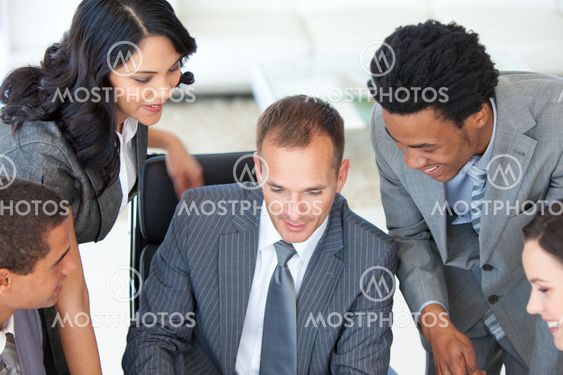Manager working with businessteam in office