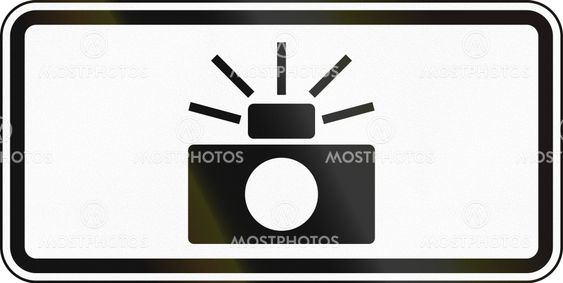 United States MUTCD road sign - Traffic laws photo enforced
