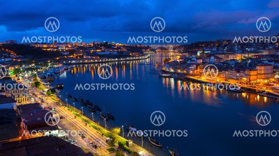 Night view of the Douro river in Porto, Portugal.