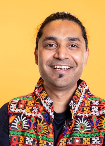 Close up shot of delighted person in traditional...