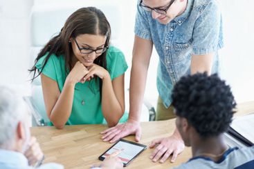 Meeting, tablet and business people in office on website...