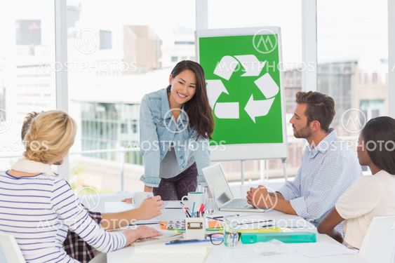 Happy team having a meeting about recycling policy