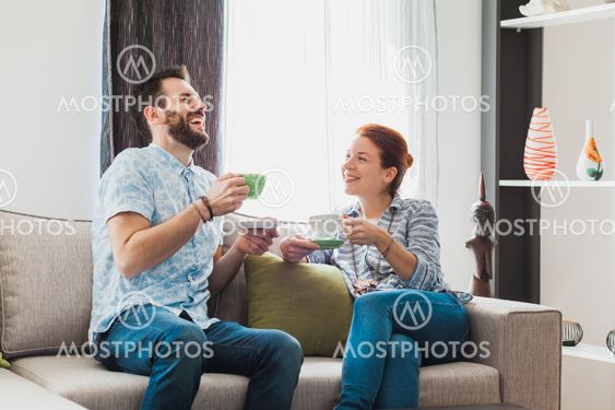 Young couple drinking coffee