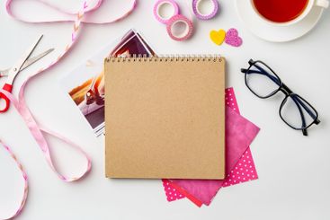 Crafting session with colorful materials and tools on a...