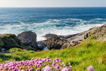 Rough and rocky shore at Malin Head, Ireland's...