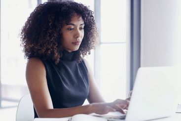Office, typing and business woman on laptop for online...