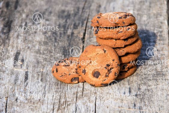 Chocolate chip cookies on rustic wooden table