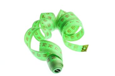 Weight loss concept. Diet. Measuring tape isolated on...