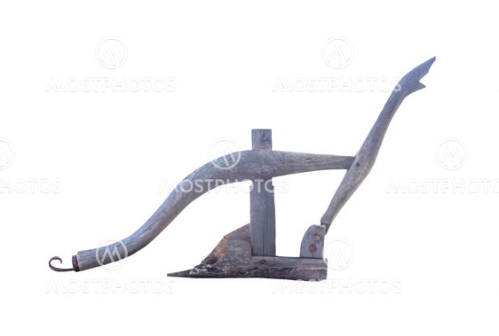 Ancient wooden plough handle isolated
