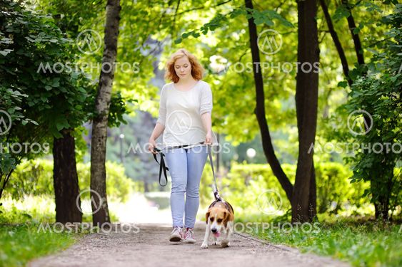 Loving female owner with her domestic pet
