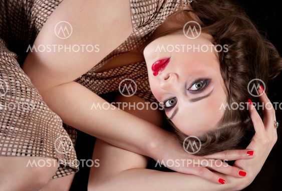 Portrait of young woman with big eyes