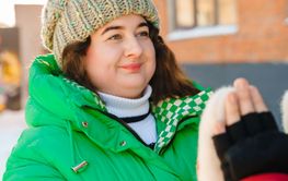 Winter plus size couple lovestory. Happy smiling man,...