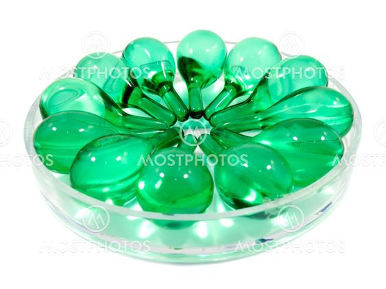 Hair vitamin serum capsule in container