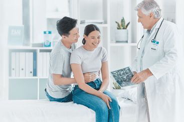 Couple, doctor and pregnancy scan at clinic, ultrasound...