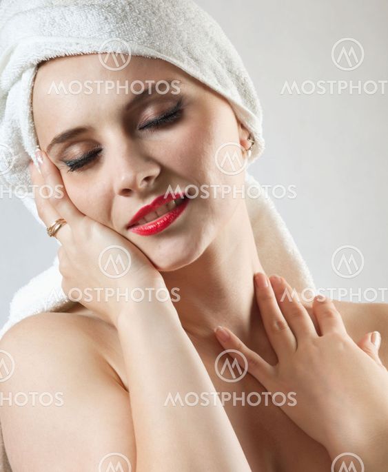 Beautiful young girl with eyes closed