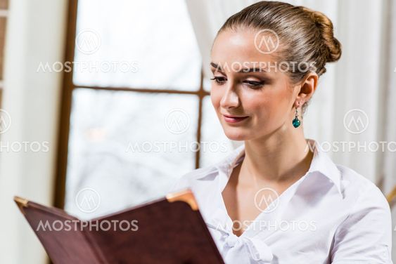 portrait of a nice lady at the restaurant