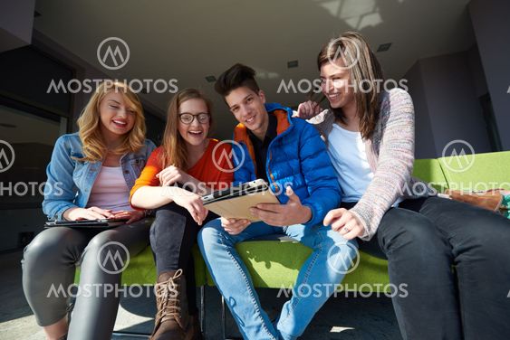 students group working on school project together