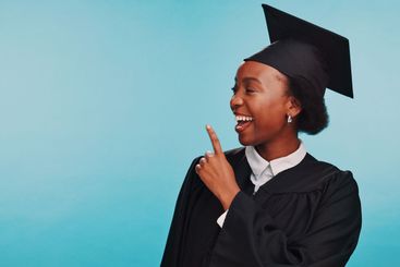 Black woman, graduation and happy with space in studio,...