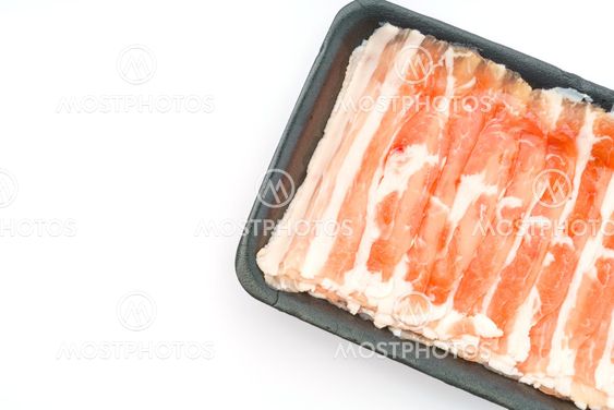 Slide of raw pork on white background .