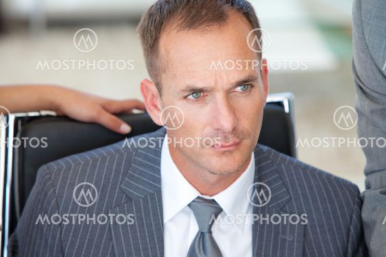 Portrait of a thoughtful male manager in office