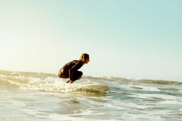 Sea, surf and blue sky mockup with a man on his...