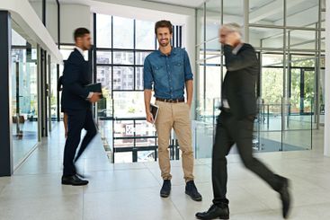 Busy business, motion blur or man with tablet in office...