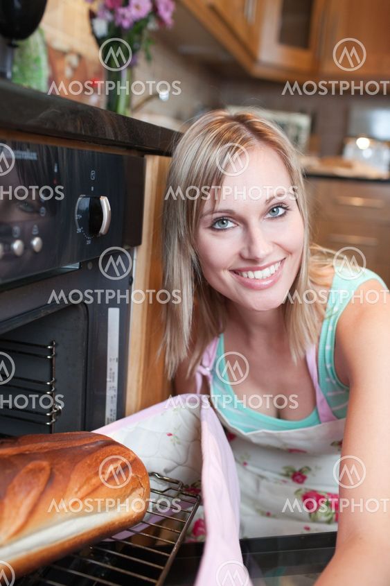 Radiant woman baking bread