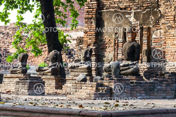 Ruin of Buddha statues in historical park,