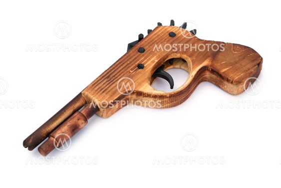Toy wooden gun , on a white background