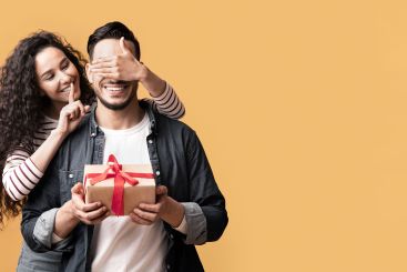 Surprise Present. Romantic young arab woman covering...