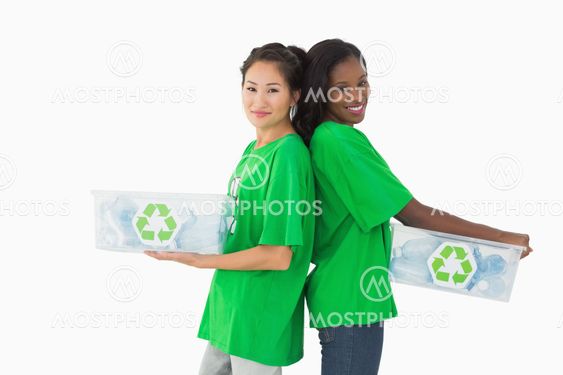 Team of environmental activists standing back to back