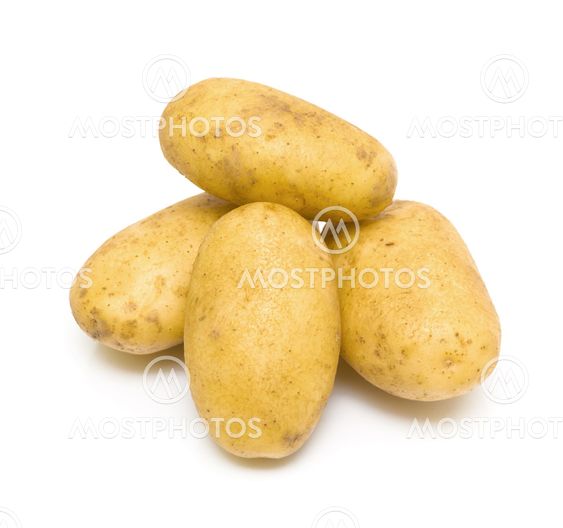 Potatoes close-up on white background