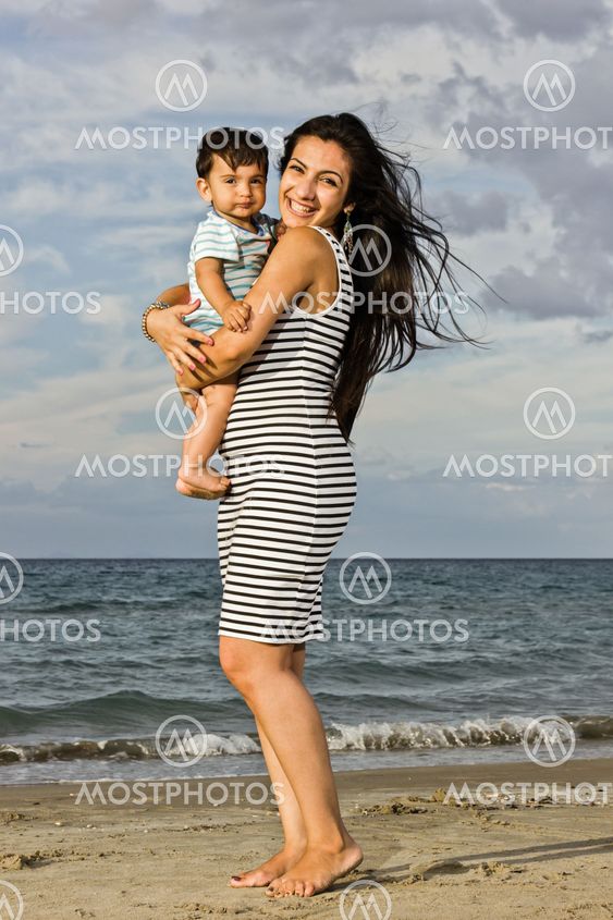happy mum at the beach